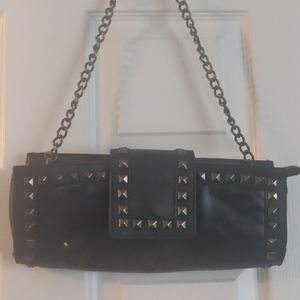 Black studded clutch